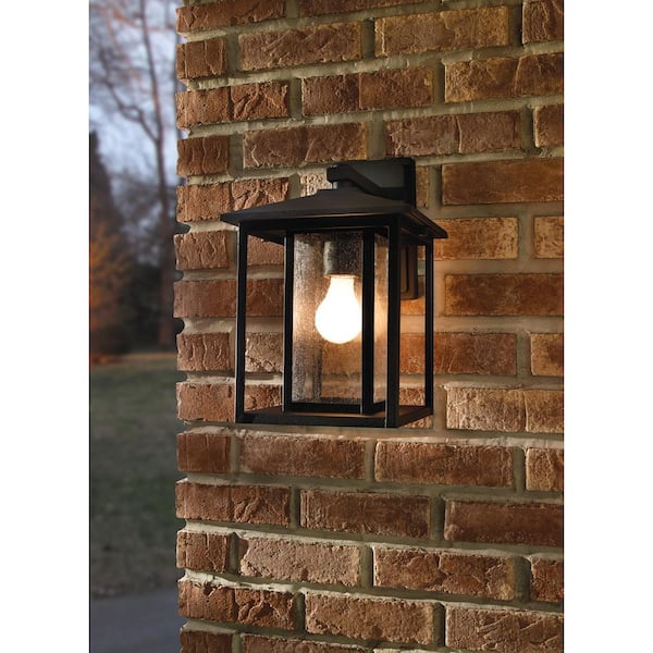 Hunnington 14 in. H 1-Light Outdoor Black Wall Lantern Sconce with Clear Seeded Glass Panels