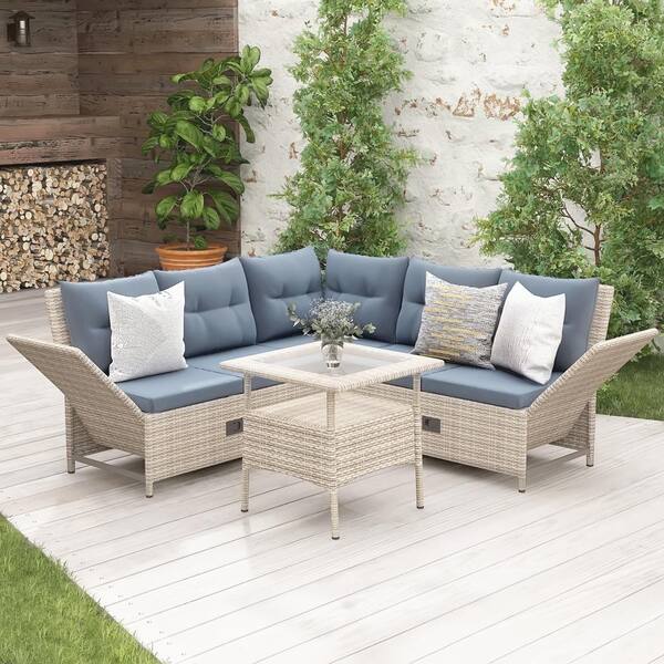 brown wicker outdoor sectional set with gray cushions