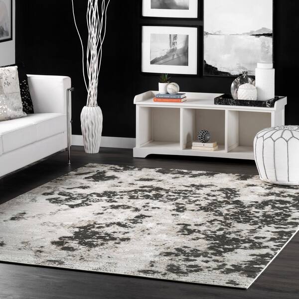 https://images.thdstatic.com/productImages/2549ad3a-b70c-41f1-b670-55863b898bdb/svn/gray-nuloom-area-rugs-cfdr06a-8010-e1_600.jpg