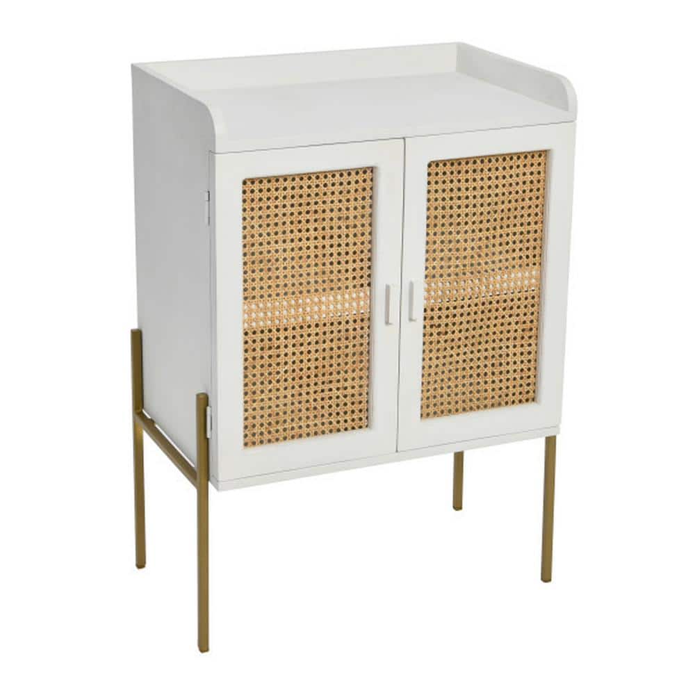 Front view of a white bar cabinet with cane panels and gold legs.
