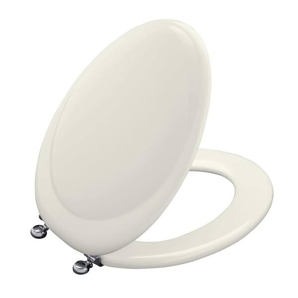 KOHLER Revival Elongated Closed-front Toilet Seat with Polished Nickel Hinge in Biscuit-DISCONTINUED