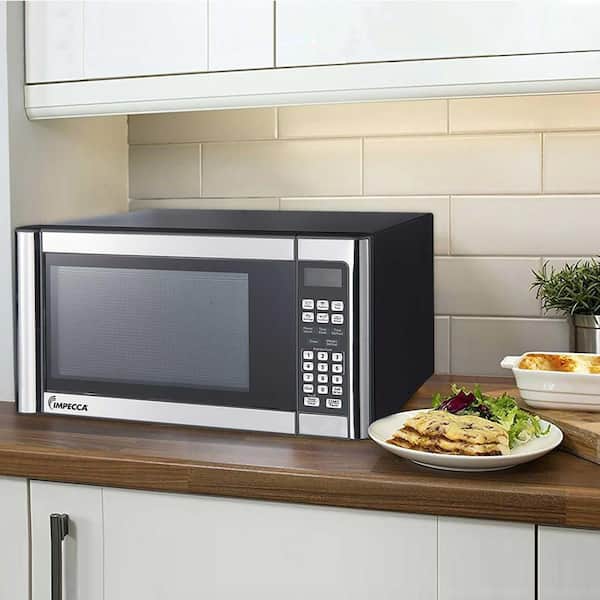 https://images.thdstatic.com/productImages/25802088-6098-46c9-be58-18e1ed175ff8/svn/stainless-look-impecca-countertop-microwaves-mcm1101st974-31_600.jpg
