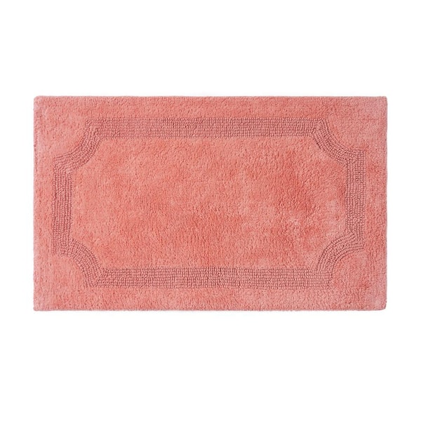 Laura Ashley Solid Reversible Coral 17 in. x 24 in. Bath Mat