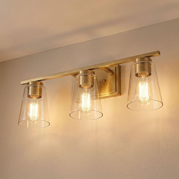 Calhoun 24 in. W x 8.75 in. H 3-Light Warm Brass Bathroom Vanity Light with Clear Tapered Cone Glass Shades