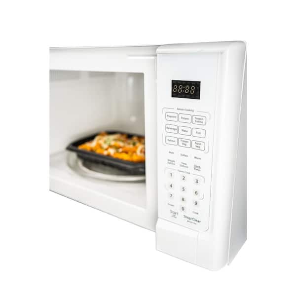 Danby 24 in. Width 1.4 cu. ft. Stainless Steel 1000-Watt Over the Range  Microwave Oven with 300 CFM Vent DOM014401G1 - The Home Depot