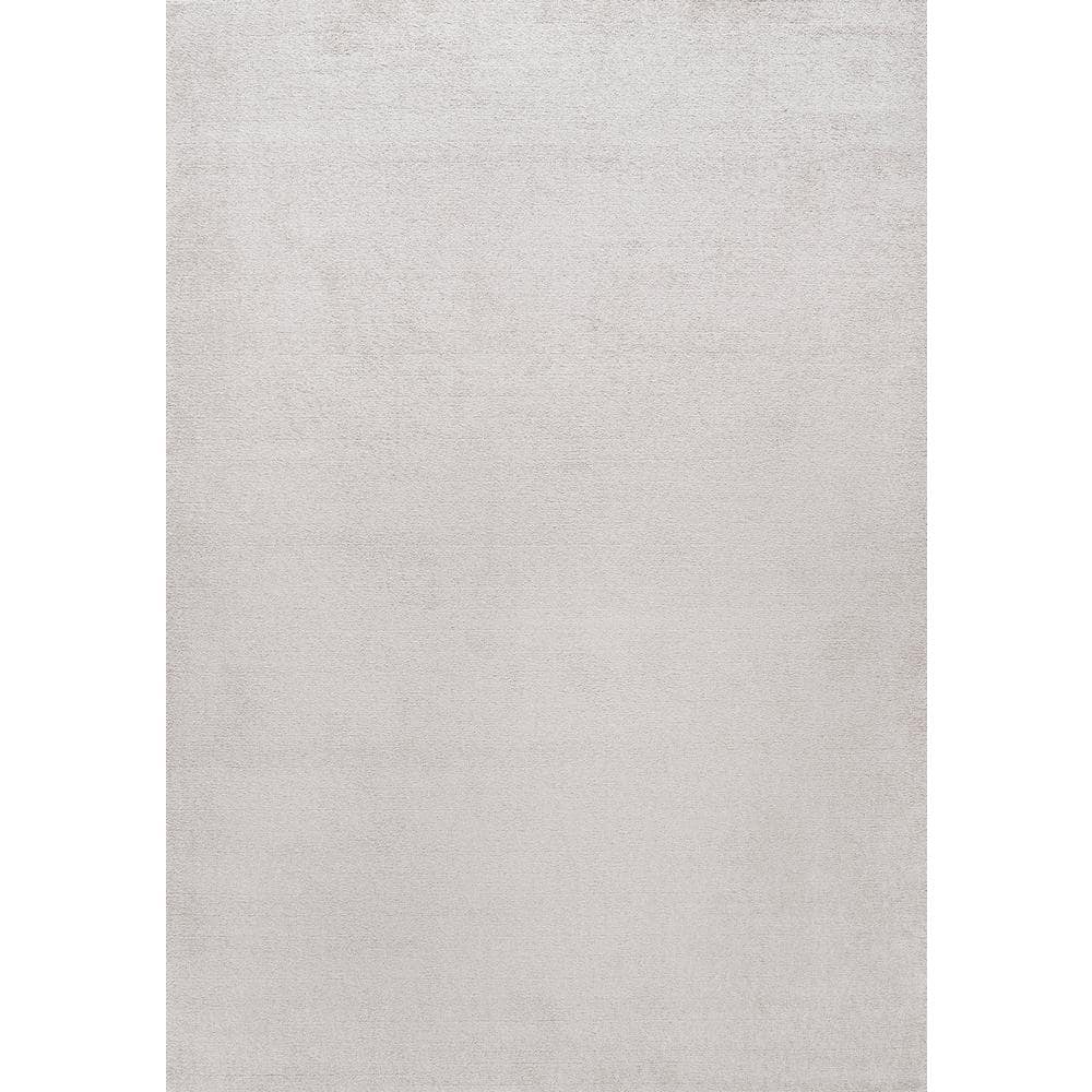 Ivory Solid Synthetic Low-Pile Rectangular Area Rug, 4' x 6'