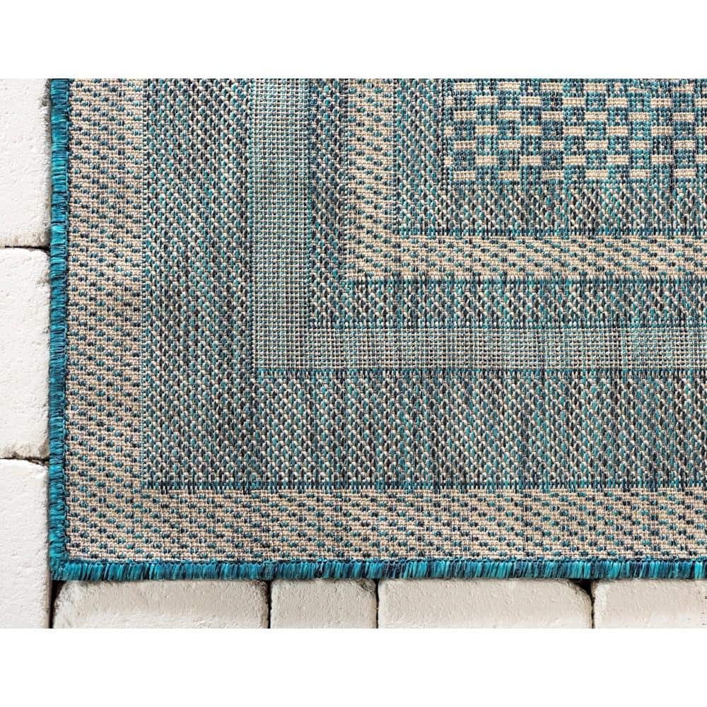 5' x 8' Teal Blue and Beige Flat Woven Outdoor Area Rug