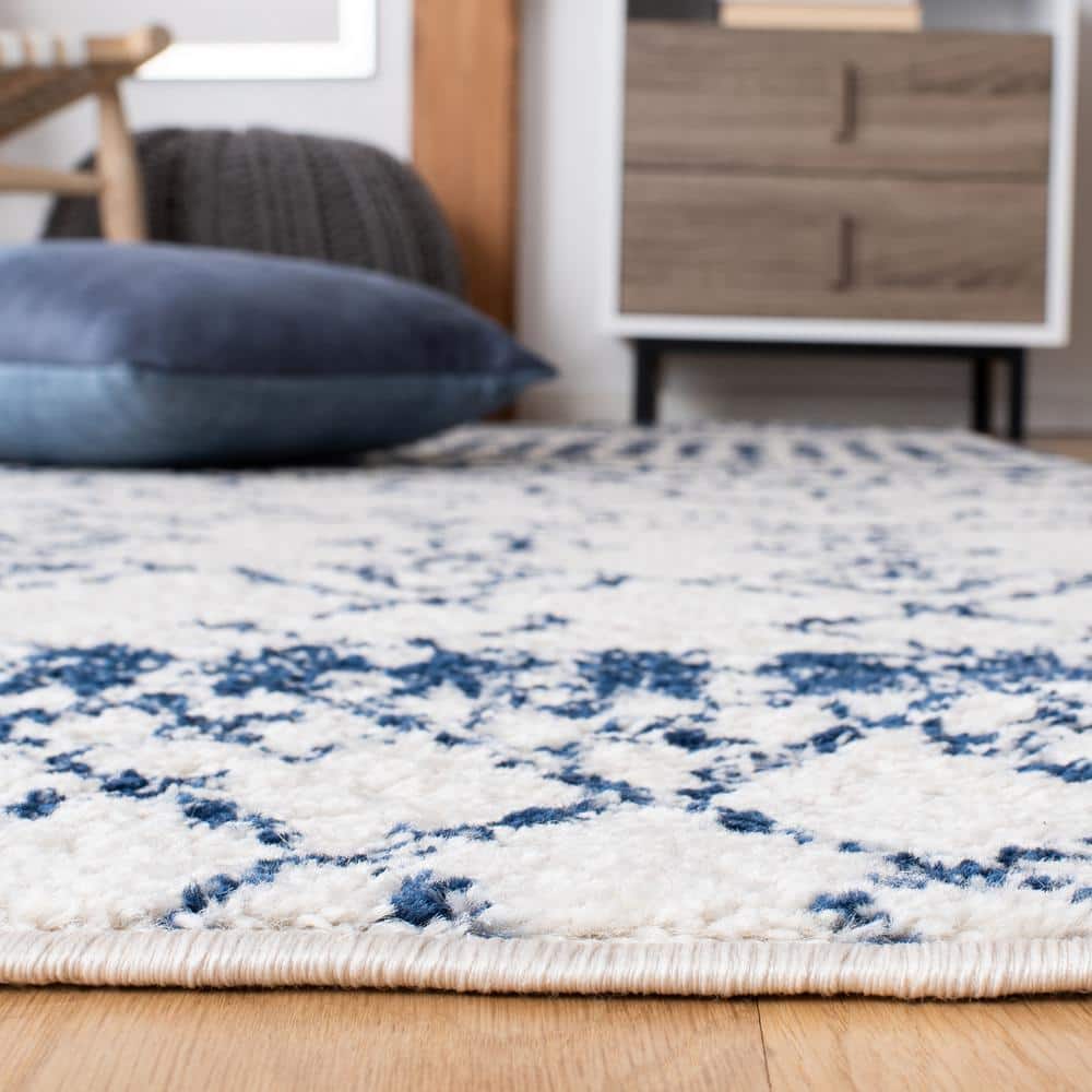 Ivory and Navy Moroccan Geometric 4' x 6' Area Rug