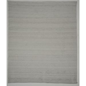 Ivory 7 ft. x 9 ft. Rectangle Solid Color Polyester Area Rug