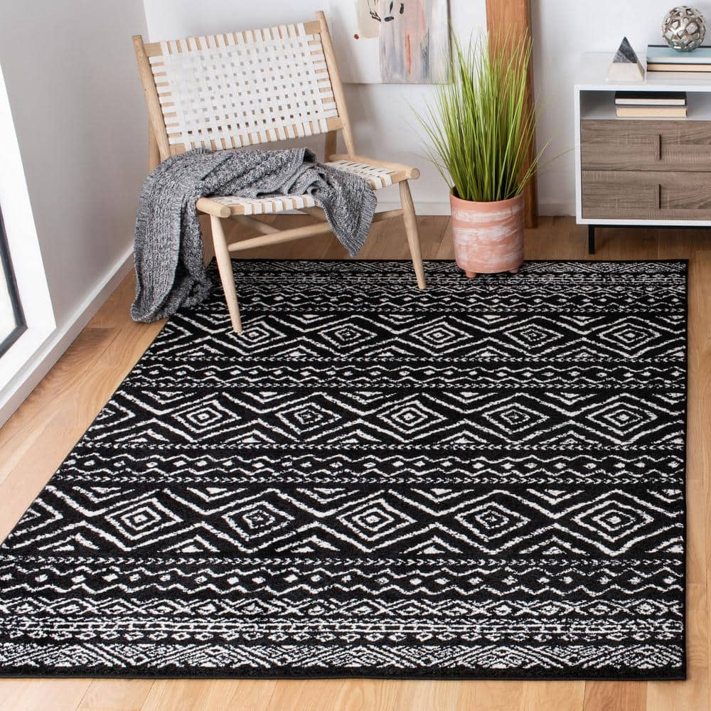 Geometric Black/Ivory Synthetic 8' x 10' Hand-knotted Area Rug