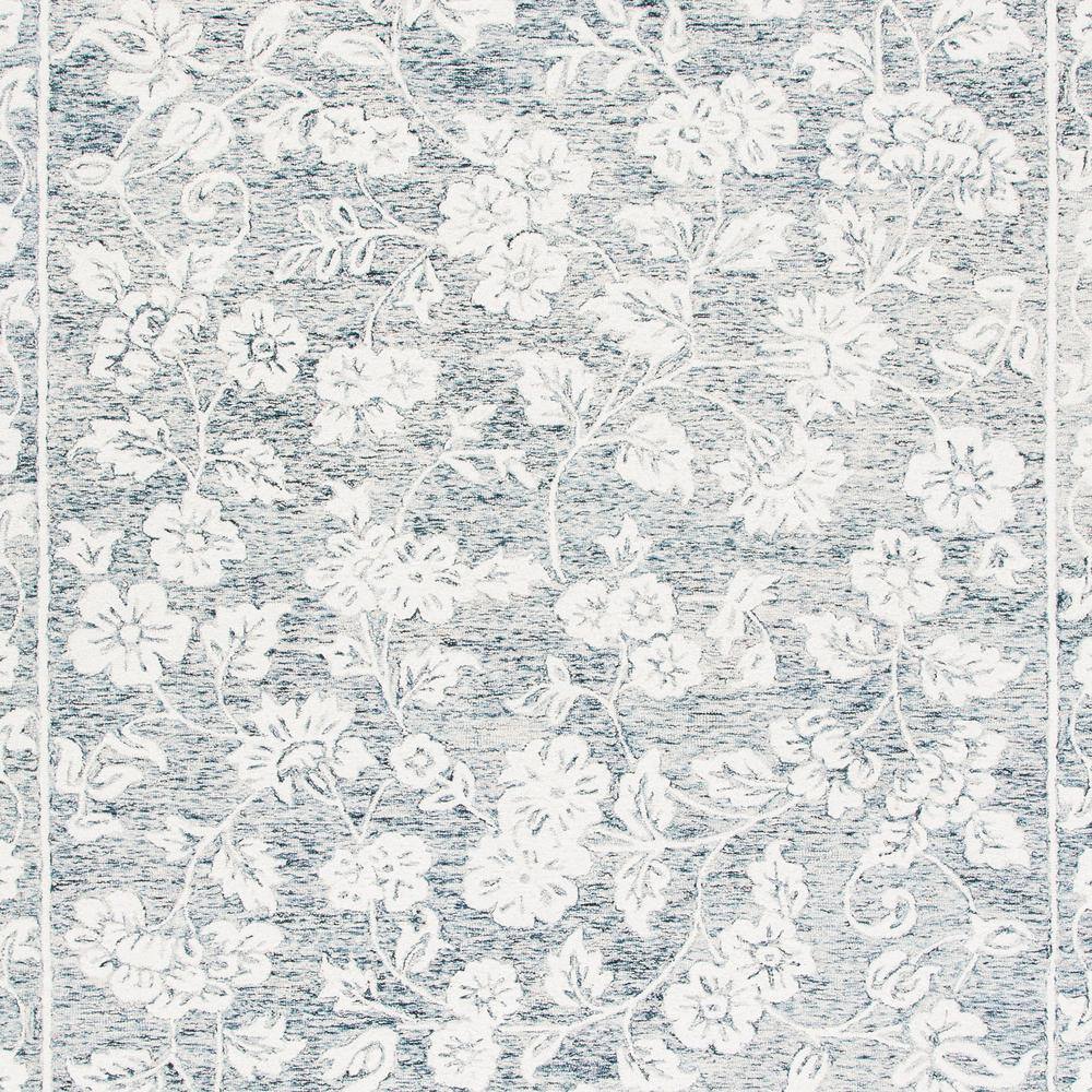 Capri Blue and Ivory Hand-Tufted Wool 8' x 10' Area Rug