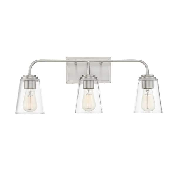 TUXEDO PARK LIGHTING 24 in. W x 9.75 in. H 3-Light Brushed Nickel Bathroom Vanity Light with Clear Glass Shades