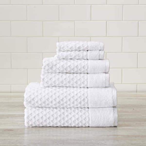 https://images.thdstatic.com/productImages/25f16803-d342-4d46-bd75-2453a5c36a83/svn/white-the-clean-store-bath-towels-446-4f_600.jpg