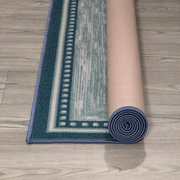 https://images.thdstatic.com/productImages/25f4f8e5-5abe-45f9-abae-ce9a1ceced0a/svn/2206-teal-blue-ottomanson-area-rugs-oth2206-3x5-4f_600.jpg