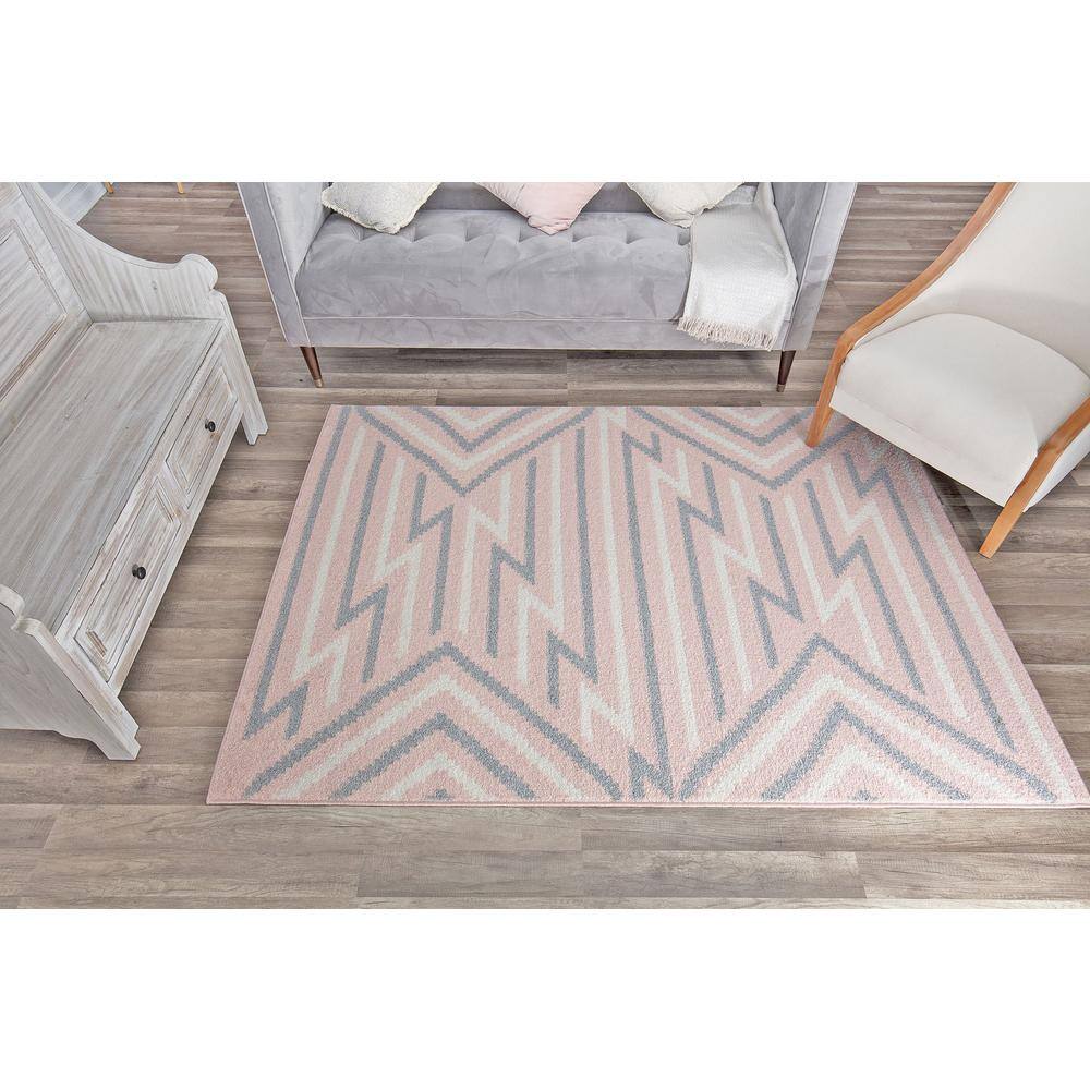 6' x 9' Gray and Pink Geometric Synthetic Area Rug