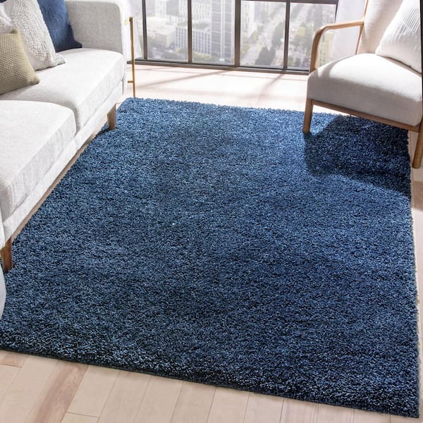 https://images.thdstatic.com/productImages/262e214a-da84-44d8-8bce-bbf63ceab701/svn/dark-blue-well-woven-area-rugs-ju-14-7-c3_600.jpg