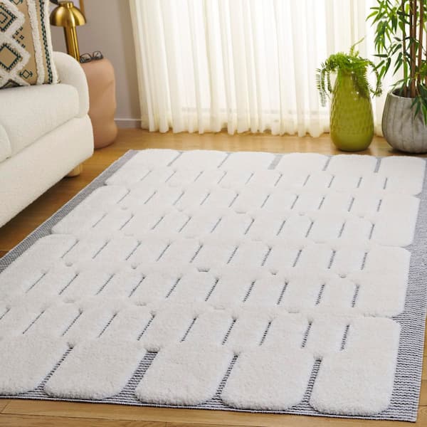 Celebrity 9 ft. x 12 ft. Ivory/Gray Abstract Border Area Rug