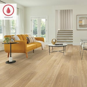 Outlast+ Wheat Patel Oak 12 mm T x 7.4 in. W Waterproof Laminate Wood Flooring (19.63 sq. ft./Case)