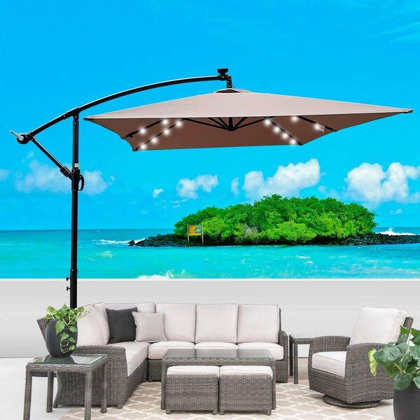 10 ft 6 ribs patio umbrella with crank JUJABU 6.5 ft. x 10 ft. 6 Ribs Steel Patio Rectangle Solar LED Lighted  Beach Umbrella with Crank and Cross Base in Mushroom POU6127033