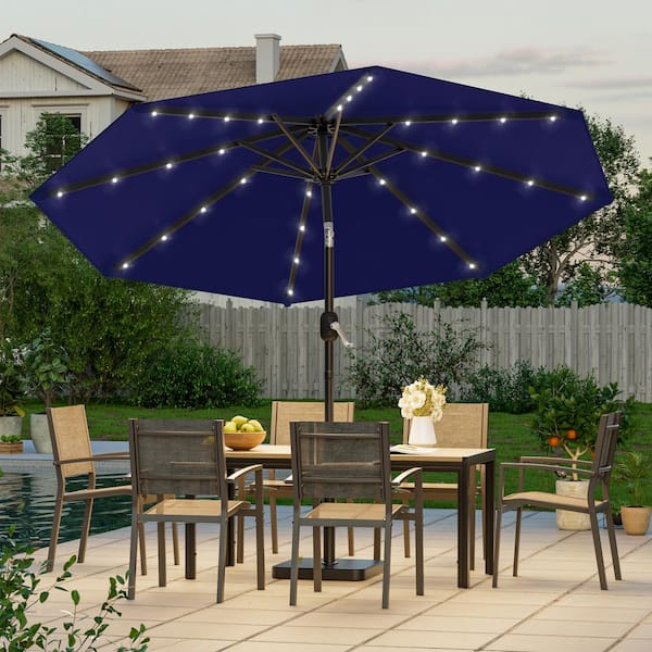 blue 9 foot patio umbrella JOYESERY 9 ft. Solar LED Market Patio Umbrellas with Solar Lights and Tilt  Button in Navy Blue J-UM-098L-LED