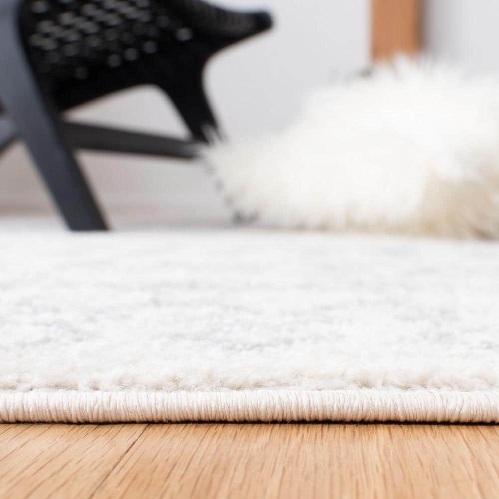 Ivory and Terracotta 79" Square Hand-Knotted Easy-Care Area Rug