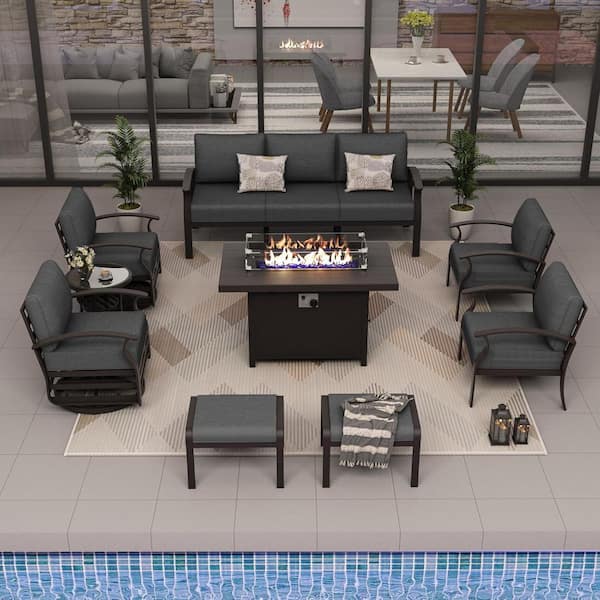 Halmuz 7-Seat Aluminum Patio Conversation Set with armrest, Fire pit Table, Swivel Rocking Chairs, Ottomans and Black Cushions