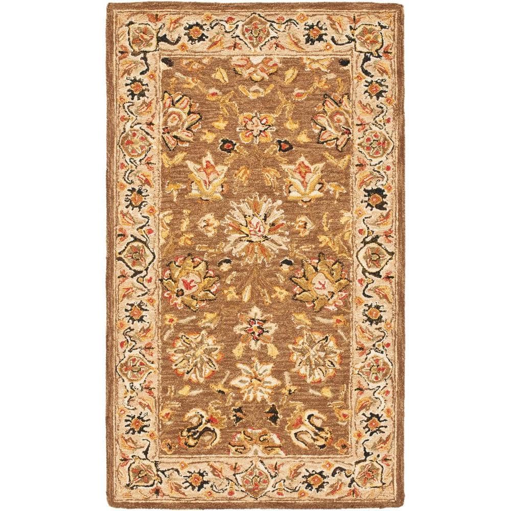 https://images.thdstatic.com/productImages/265b5ec6-bbce-4ad5-a5bd-0a2ab5731712/svn/brown-ivory-safavieh-area-rugs-hk505b-3-64_1000.jpg