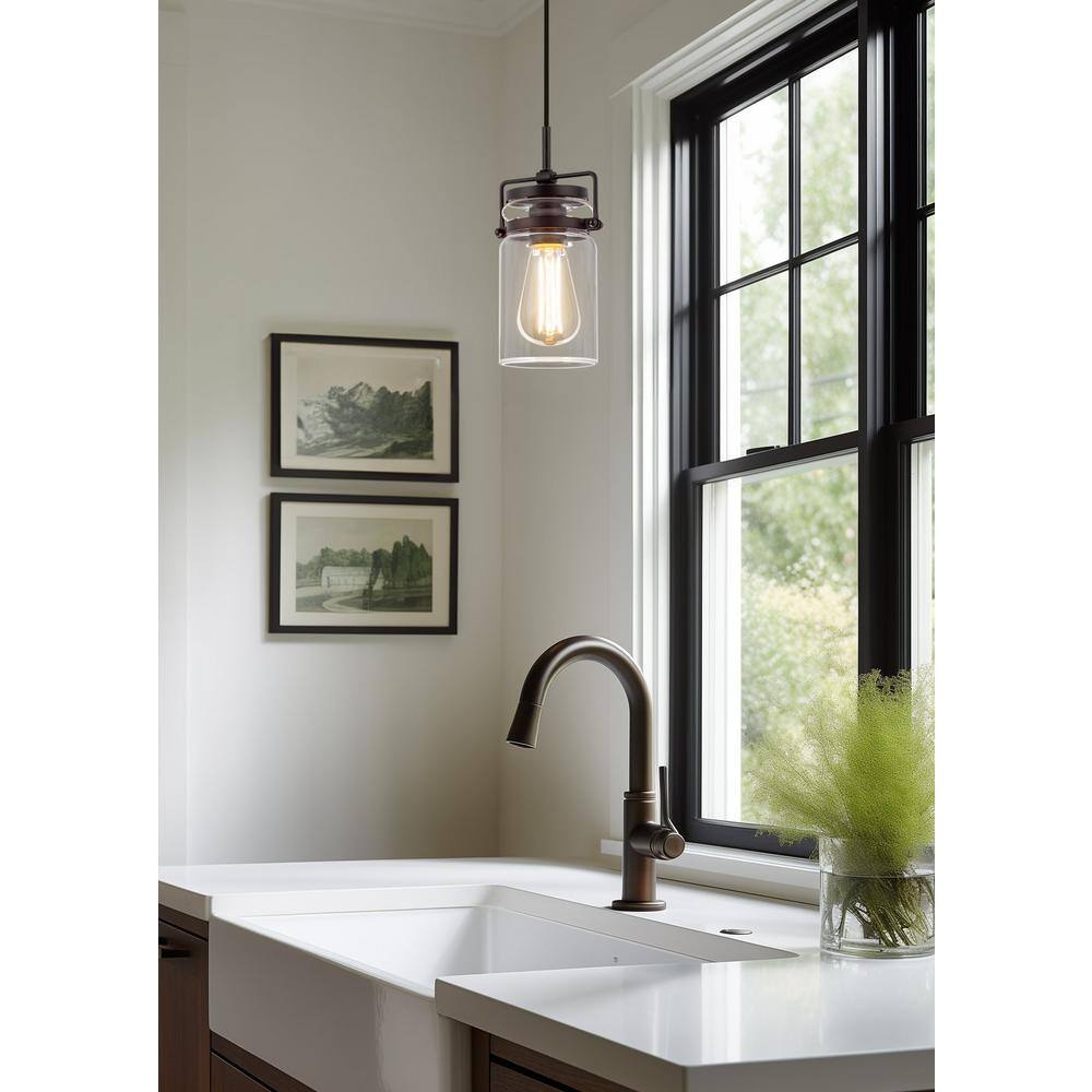 Wyer 8" Bronze Industrial Pendant Light with Clear Glass Shade