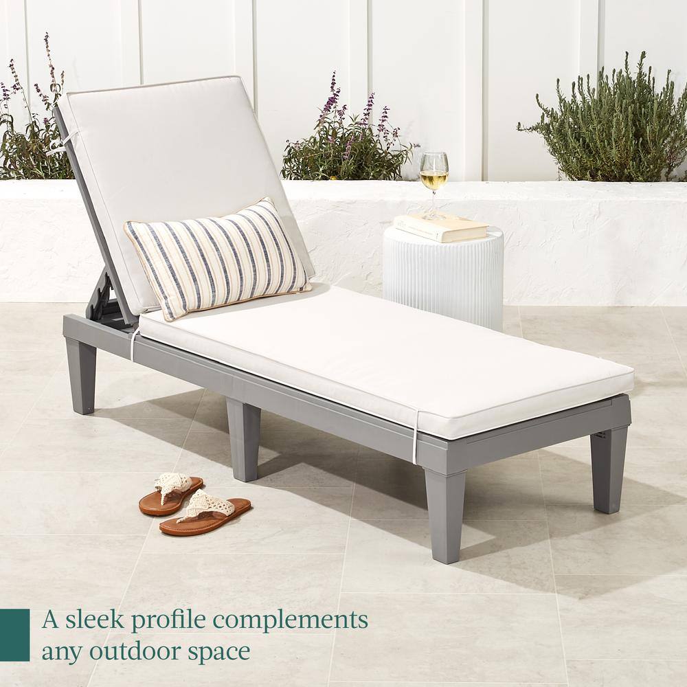 Gray Resin Patio Chaise Lounger with White Cushions