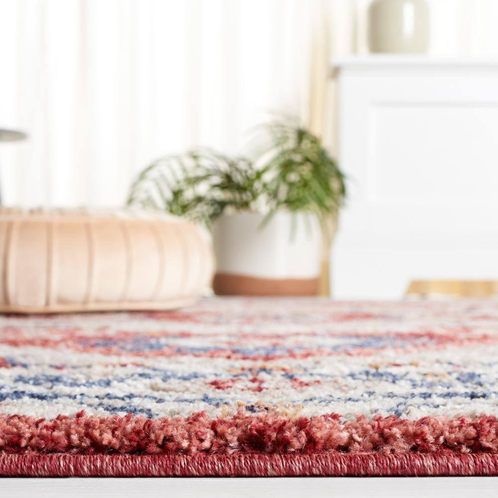 Luna 4'5" x 6'5" Blue and Rust Synthetic Area Rug