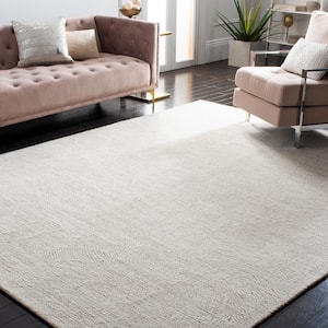 Metro Natural/Ivory 9 ft. x 12 ft. Solid Color Abstract Area Rug
