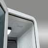 Interior view showing damping panels and lighting inside the booth.