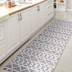 Aylan Black/Ivory 2 ft. x 8 ft. High-Low Pile Knotted Trellis Geometric Indoor/Outdoor Runner Rug