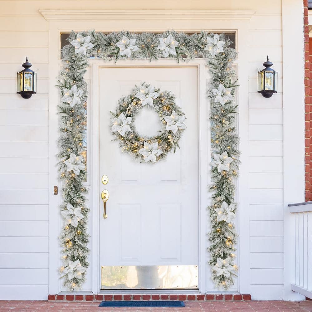 Glitzhome 2PK 9 ft. Pre-Lit Artificial Christmas Garland and 24 in. D Snow Flocked Greenery Pine Poinsettia Christmas Wreath Set