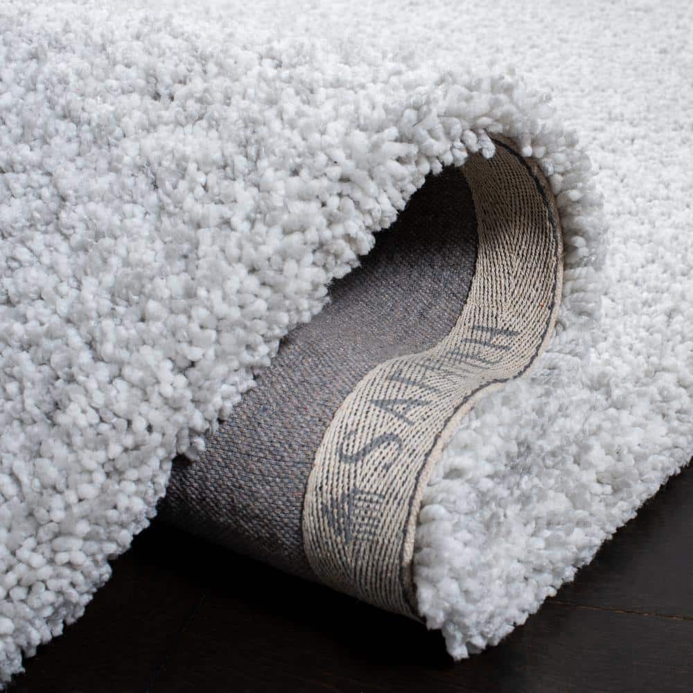 Elysian Ivory Shag Hand-Tufted Rectangular Rug - 5' x 8'