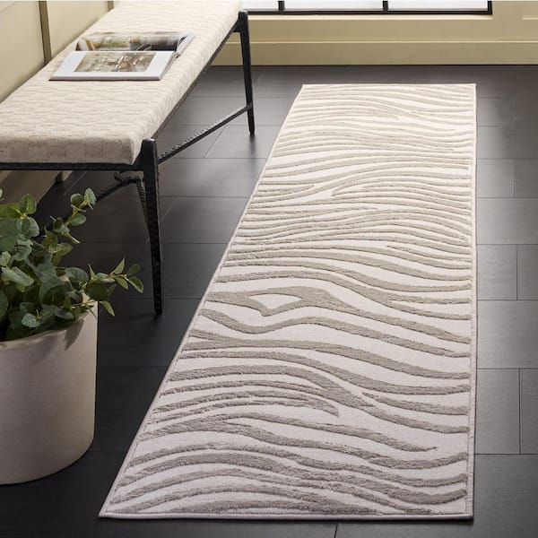 Saylor 2 ft. x 8 ft. Beige/Ivory Tiger Print Runner Rug