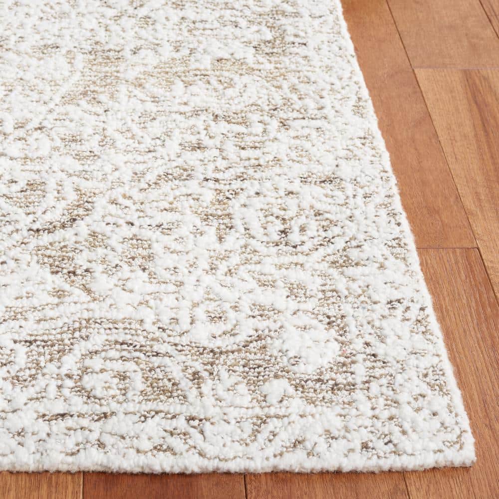 Ivory Rectangular Tufted Wool and Synthetic Rug, 5' x 8'