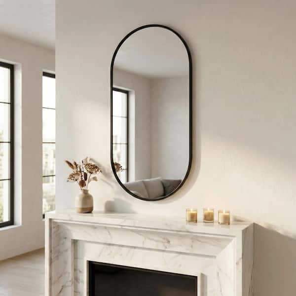 Black 20 in. x 40 in. Modern Capsule Oval Metal Framed Mirror