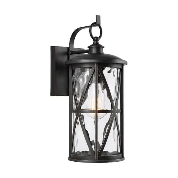 Generation Lighting Millbrooke Small 7 in. W 1-Light Antique Bronze Outdoor Wall Mount Lantern with Water Glass