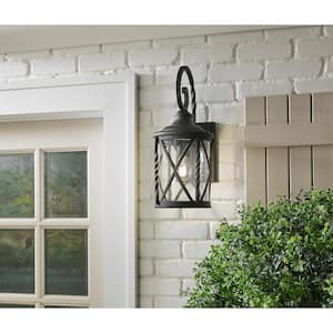 Walcott Manor 18.75 in. 1-Light Black Industrial Hardwired Outdoor Wall Light Lantern Sconce with Clear Seeded Glass