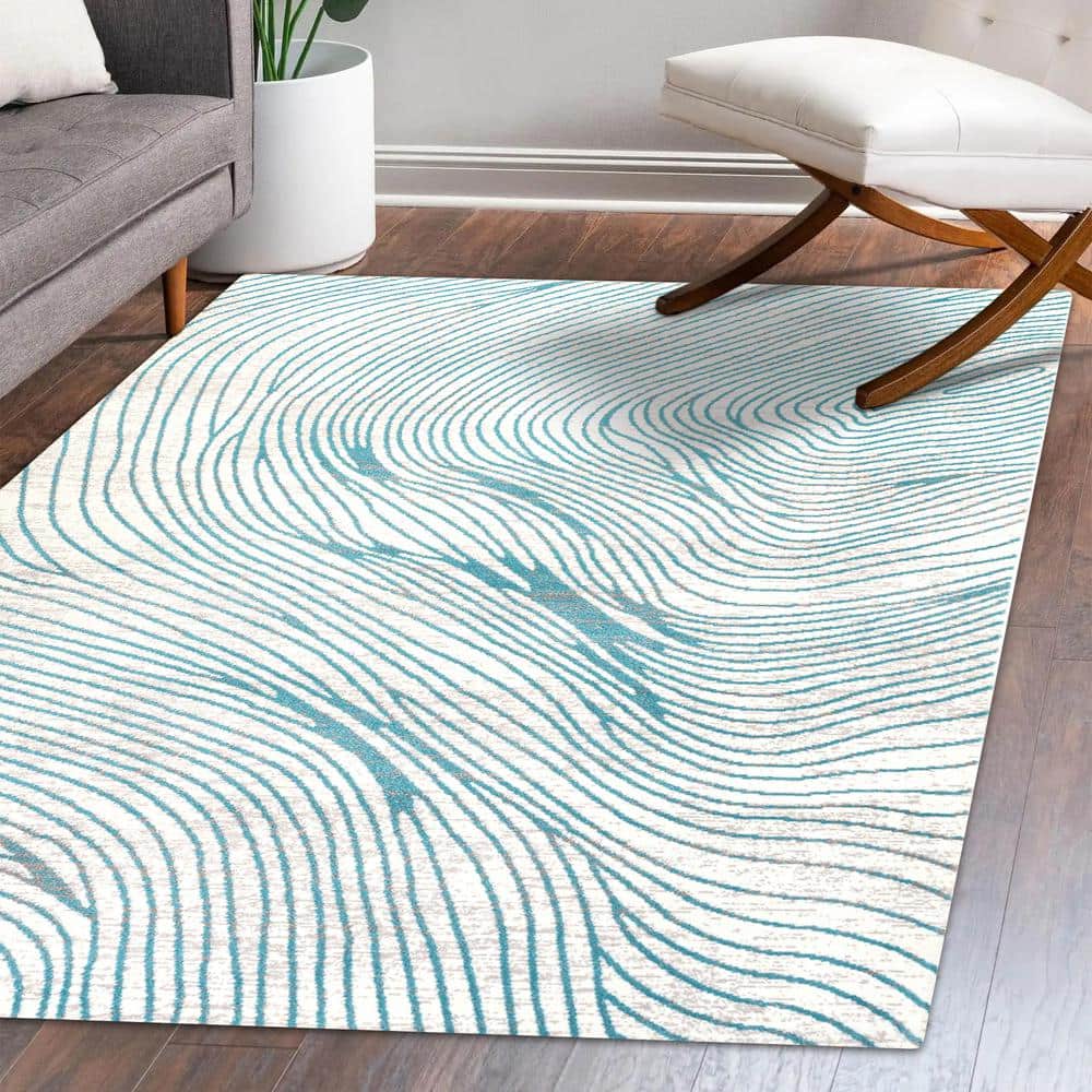Ivory and Blue Geometric Synthetic 5x8 Area Rug