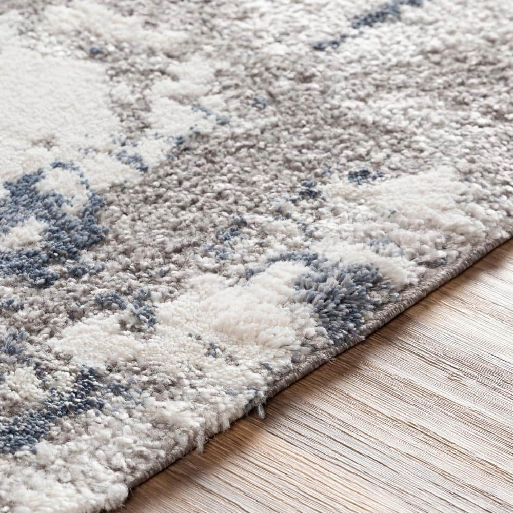 Blue and Beige Abstract 9' x 12' Synthetic Area Rug