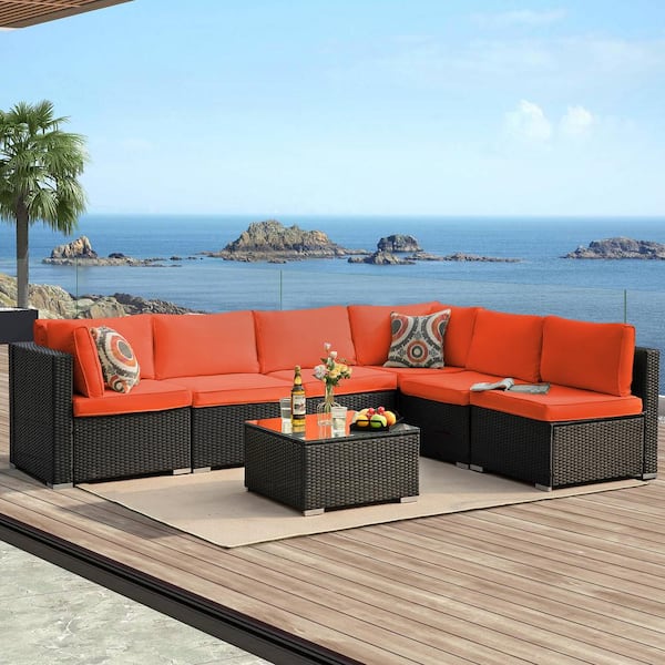 Black 8-Piece Wicker Patio Conversation Set, Sofa Set with Orange Cushions, Glass Table and Fire Pit