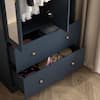 Close-up of drawers and interior shelves of wardrobe.