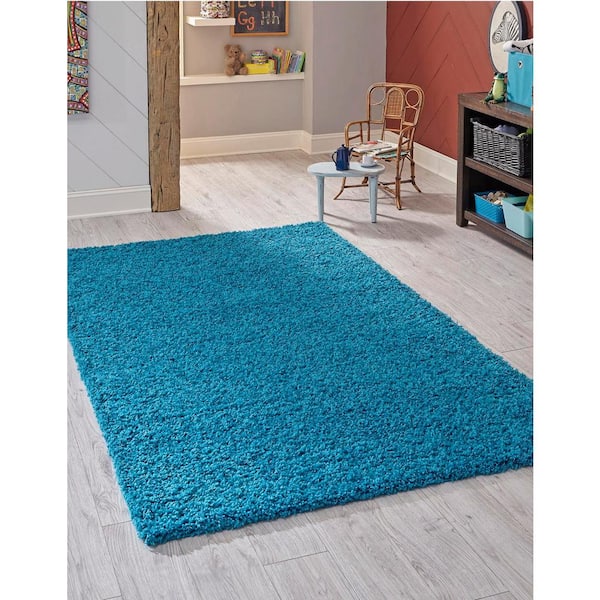 Solid Shag Turquoise 7 ft. x 10 ft. Area Rug