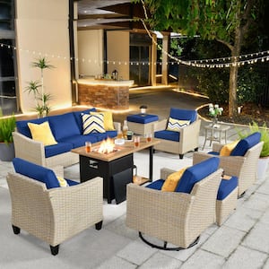 Oconee 9-Piece Wicker Patio Conversation Sofa Set with Swivel Rocking Chairs, a Storage Fire Pit and Navy Blue Cushions