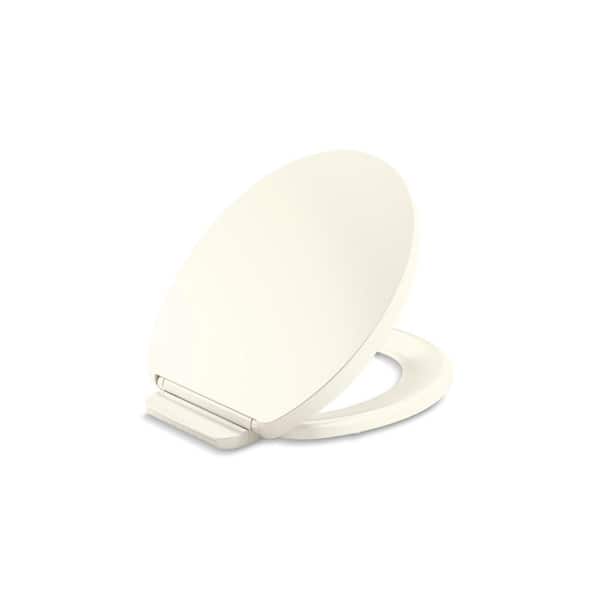 KOHLER Impro ReadyLatch Quiet-Close Elongated Front Toilet Seat in Biscuit