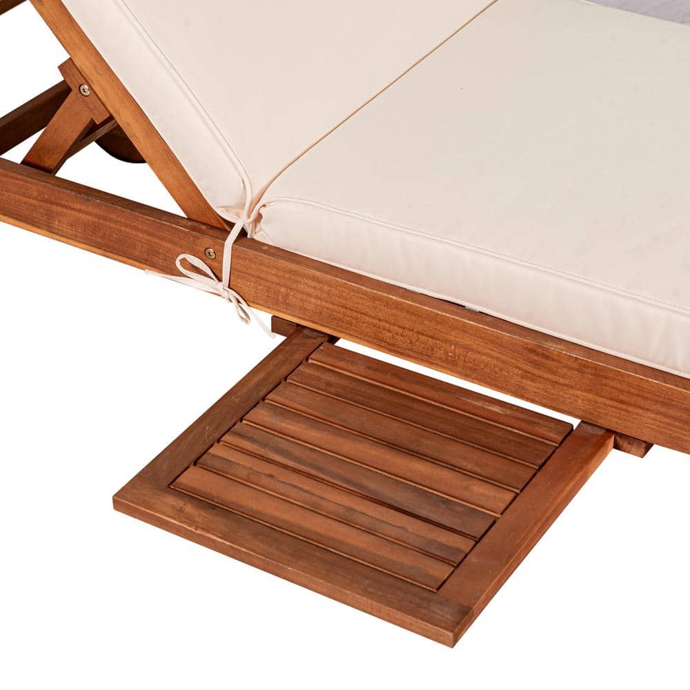 Seabrook 69" Acacia Wood Outdoor Lounger with Cream Cushion and Slide Table