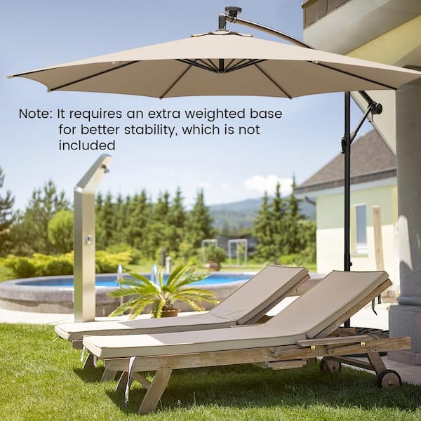 10ft offset hanging patio umbrella HONEY JOY 10 ft. Solar Tilted Cantilever Hanging Patio Umbrella with LED  Lights Sun Shade Offset Umbrella in Beige TOPB006931
