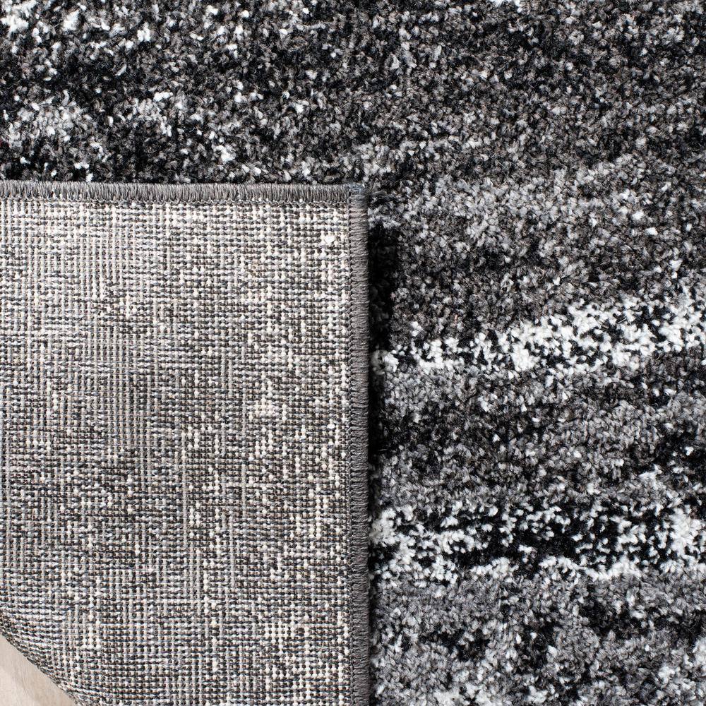 Modern Abstract Silver & Black Round Synthetic Area Rug, 9' Diameter